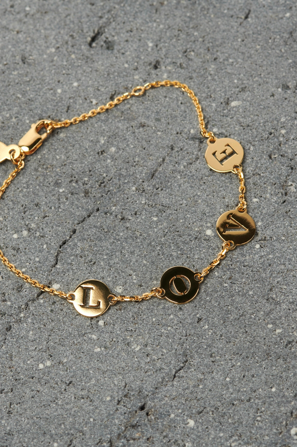 Four Emblem Coin Bracelet